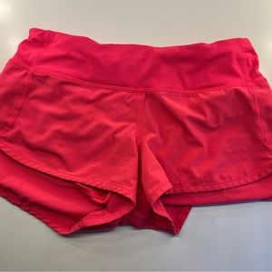 lululemon speed up shorts coral in 2.5 inches.